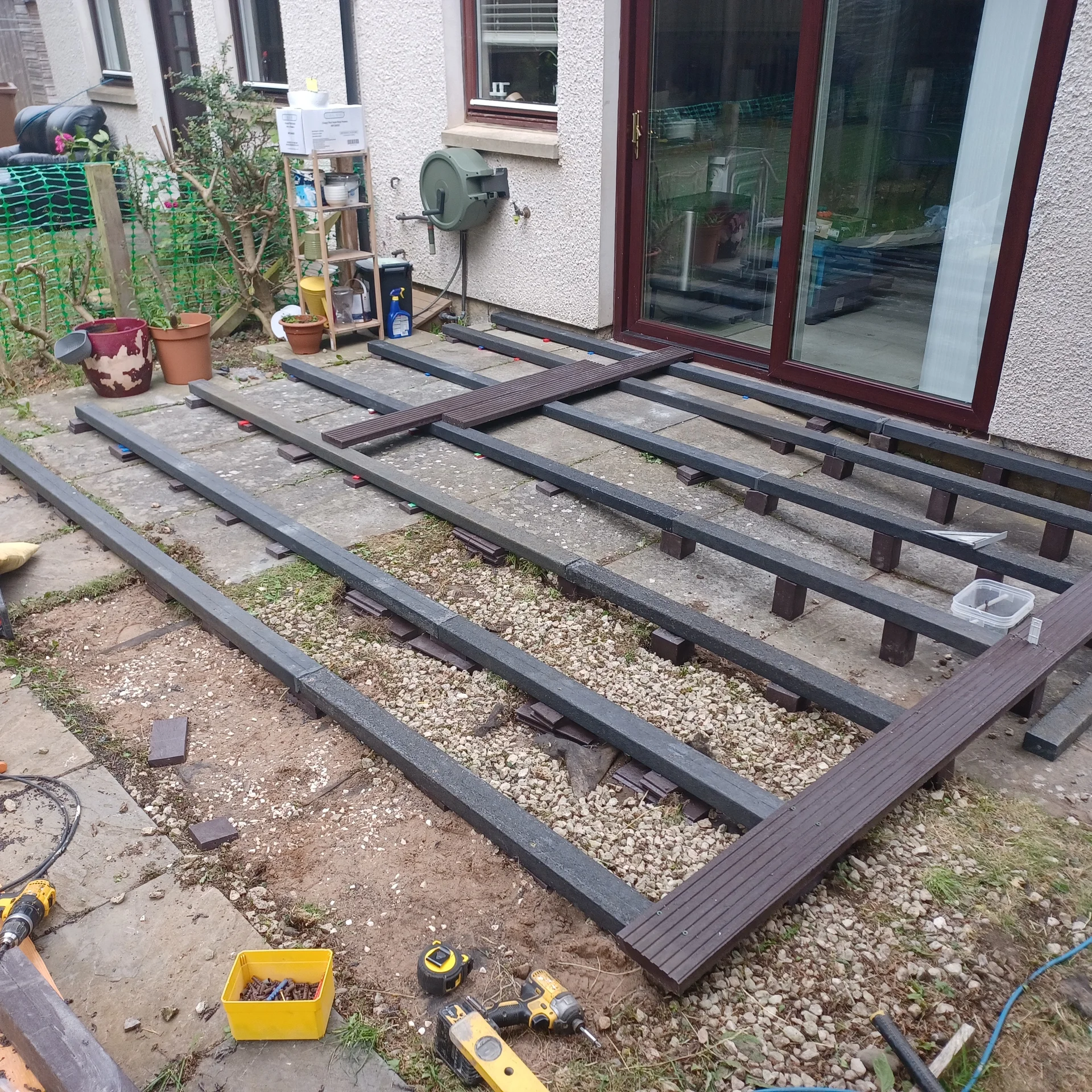 Recycled plastic decking boards and joists