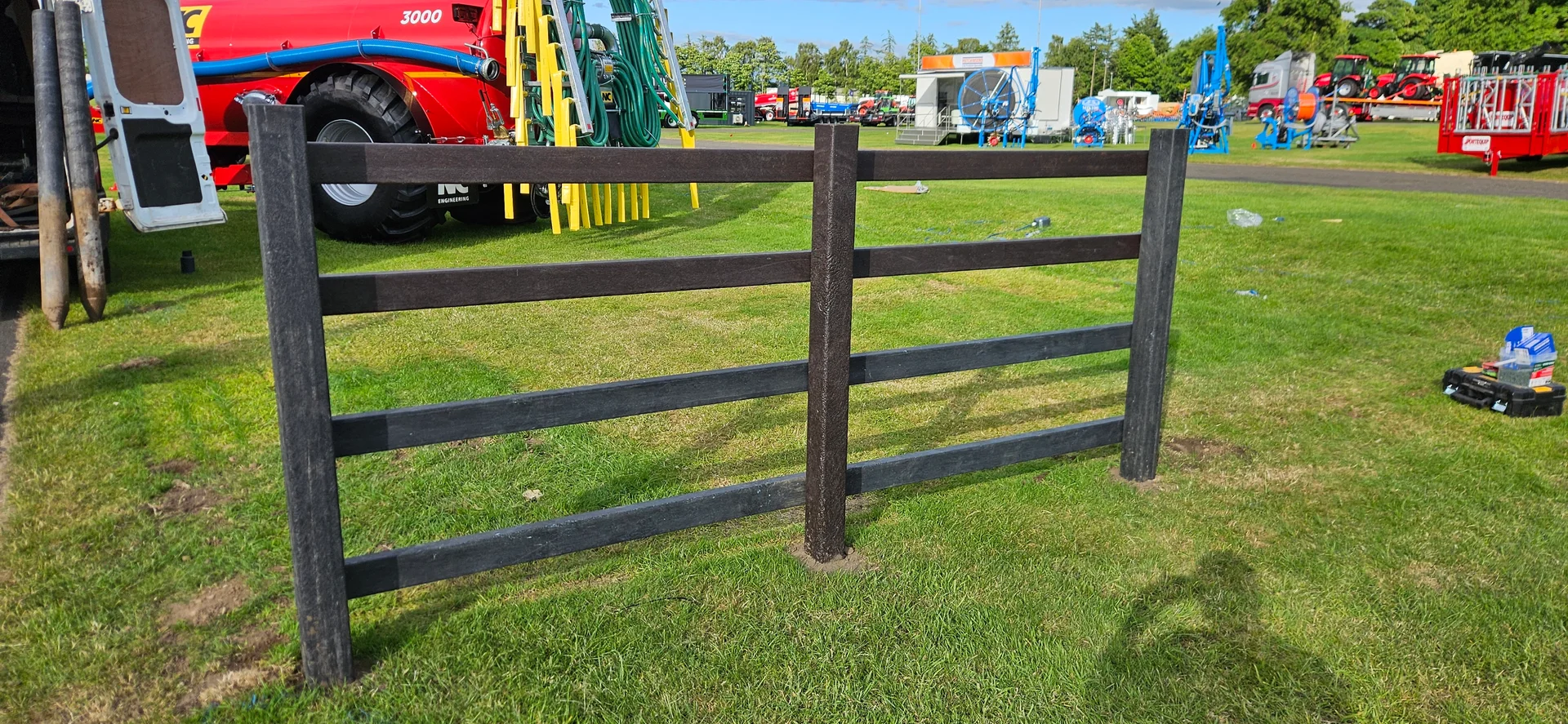 Recycled plastic three-rail paddock fence for horses