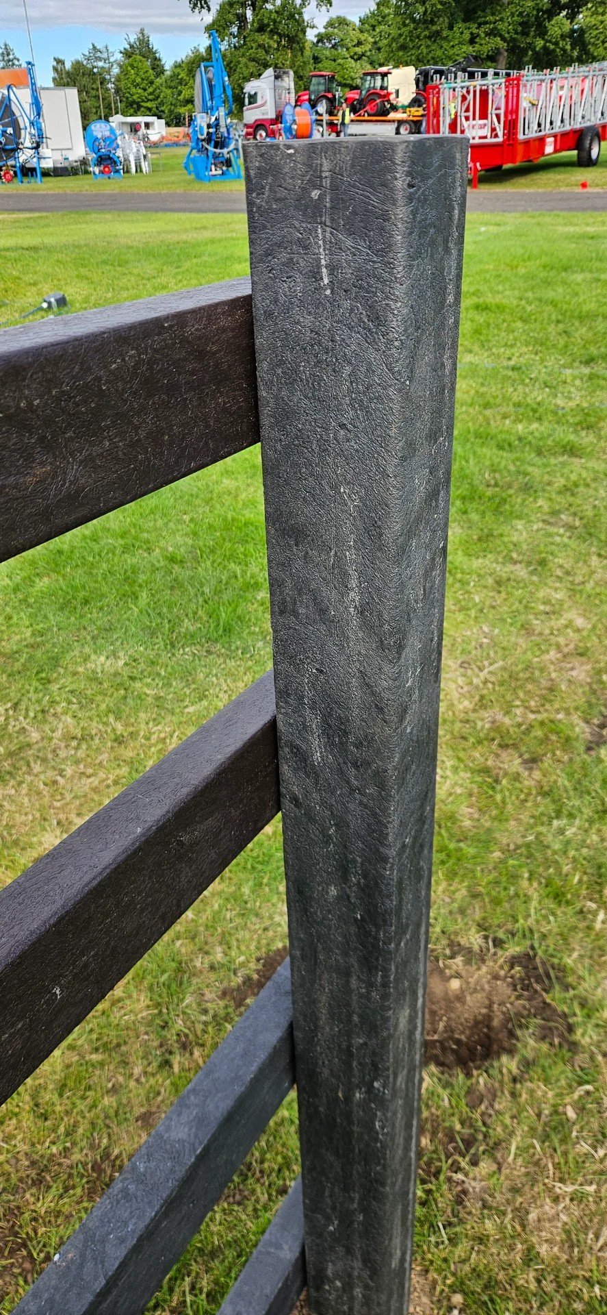 Recycled plastic pointed fence post close-up showing pointed end profile